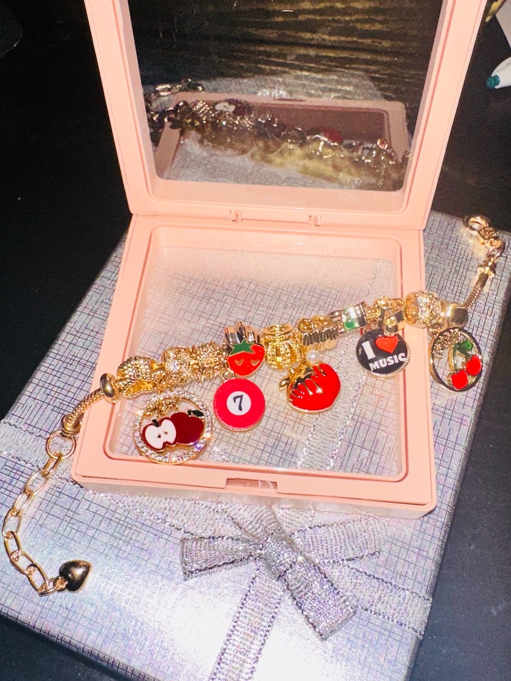 Gold Charm Bracelet with Red Enamel Fruit and Music Charms